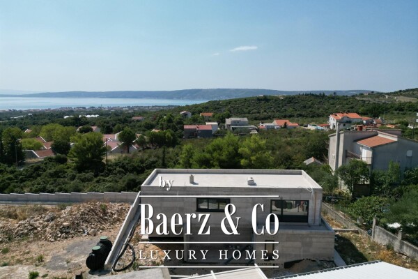 photo 26 Kaštel Novi, modern villa under construction with pool and sea view.